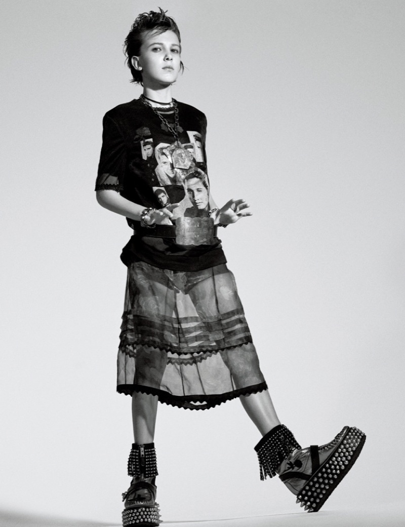 Striking a pose, Millie Bobby Brown wears Coach t-shirt, dress and shorts