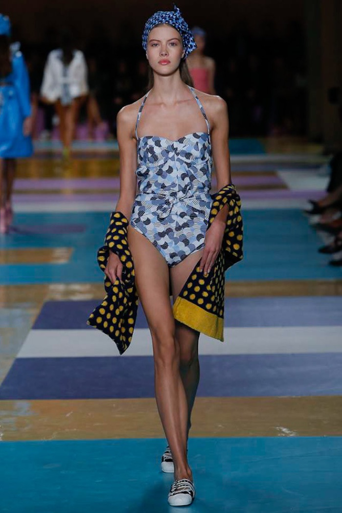 Miu Miu Spring 2017: Model walks the runway in one-piece swimsuit and coverup