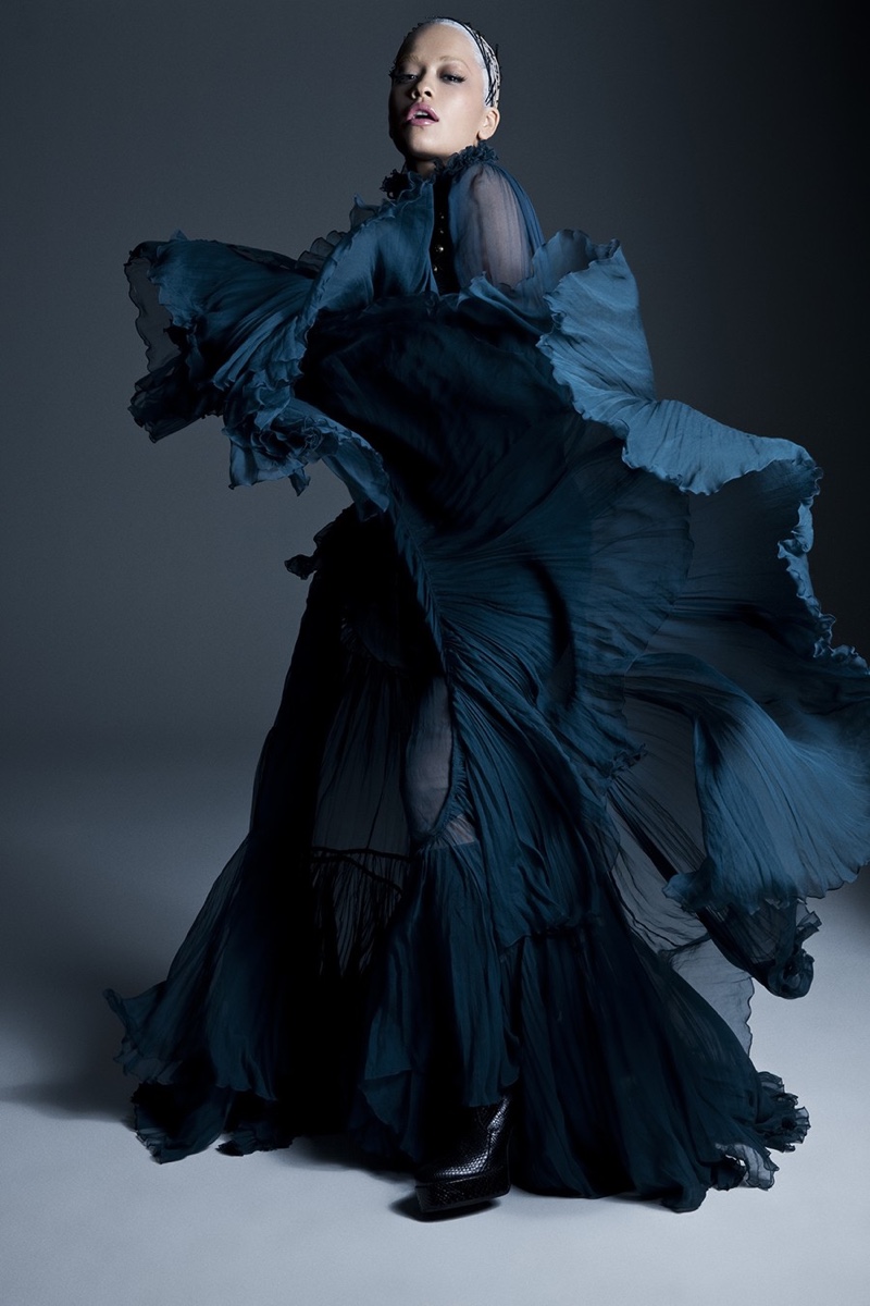 Striking a pose, Rita Ora wears a Roberto Cavalli maxi dress