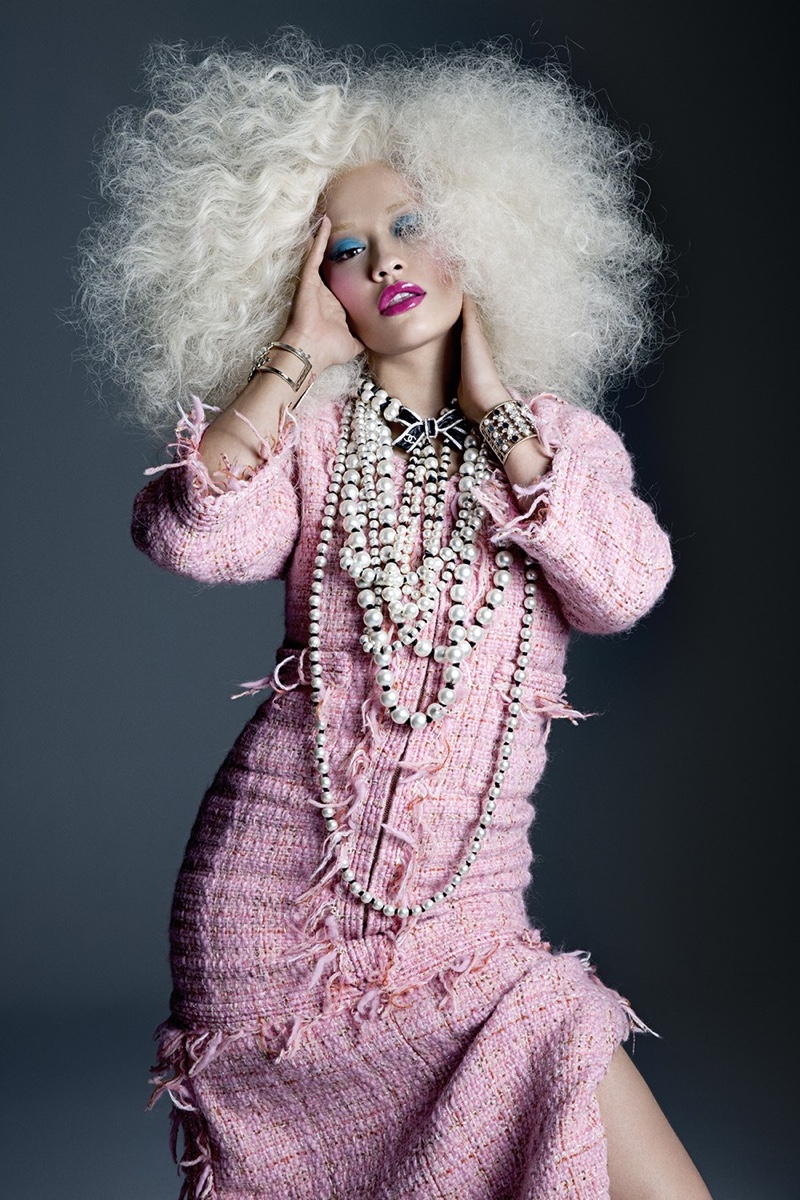 Looking pretty in pink, Rita Ora wears tweed Chanel dress, necklaces and cuffs