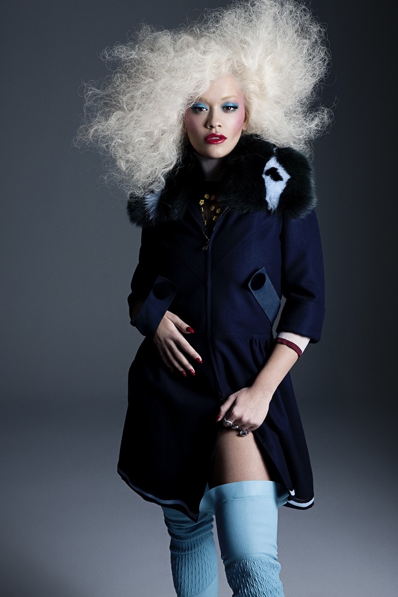 Looking glam, Rita Ora poses in Fendi coat, boots and sweater