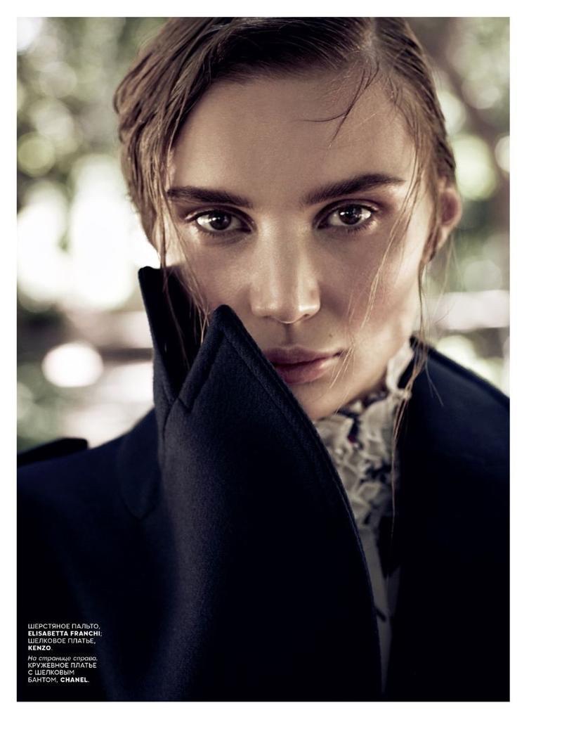 Model Natalia Daragan gets her closeup in coat and lace top