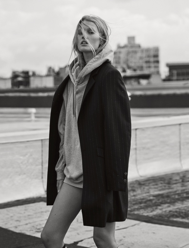 Layering up for cold weather season, Toni Garrn wears Hugo coat and sweater