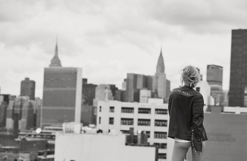 Toni Garrn flaunts her bum in Calvin Klein Collection t-shirt and Philipp Plein leather jacket