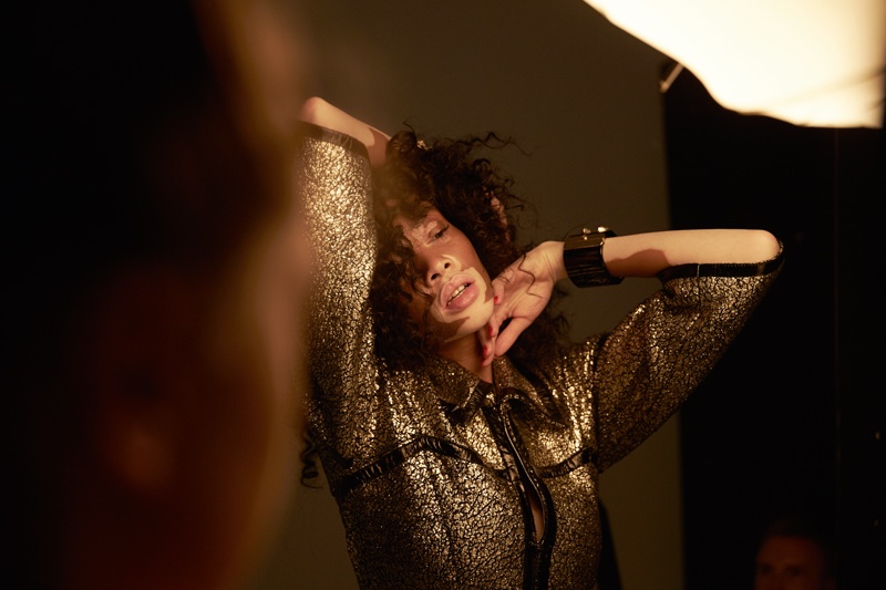 Winnie Harlow poses behind the scenes at Hunger Magazine shoot