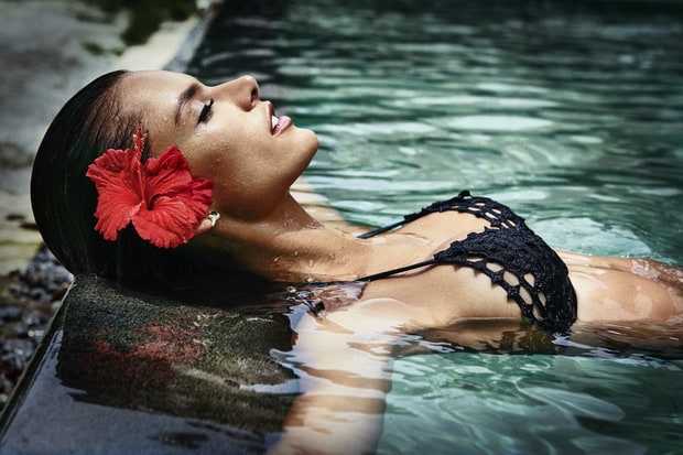 Model Alessandra Ambrosio wears black crochet bikini top