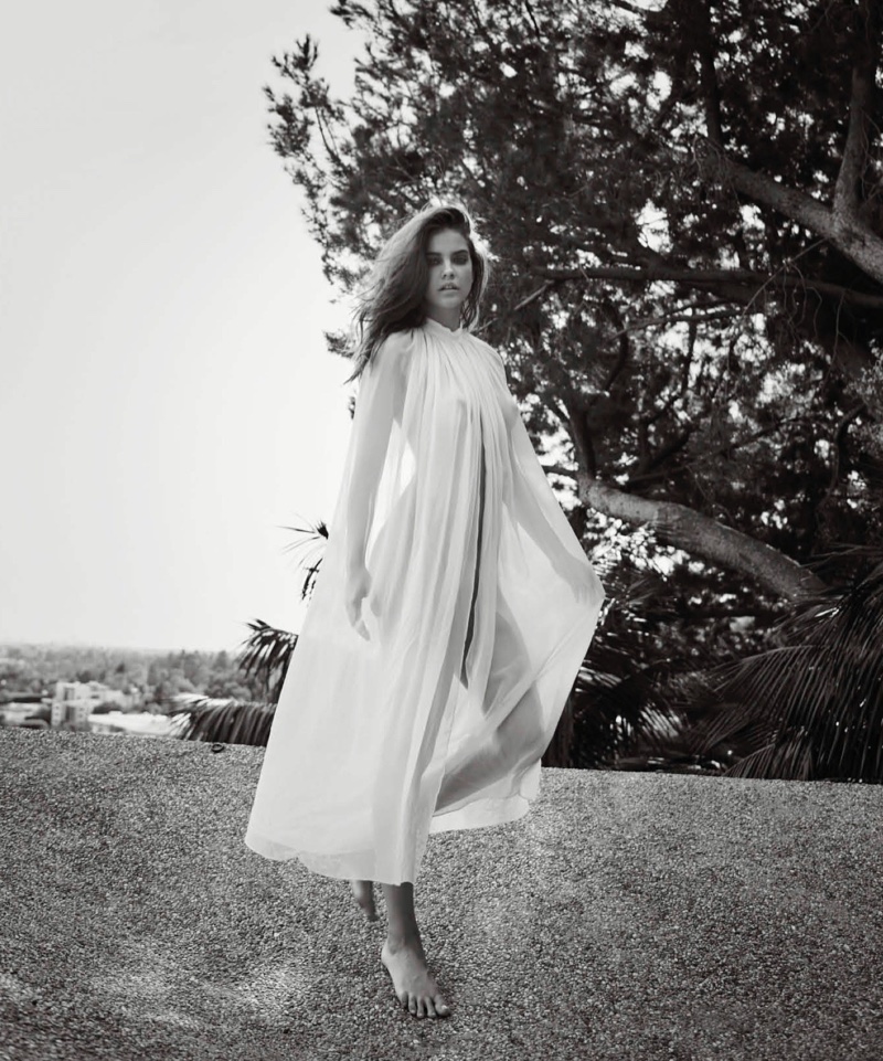 Model Barbara Palvin wears sheer white dress