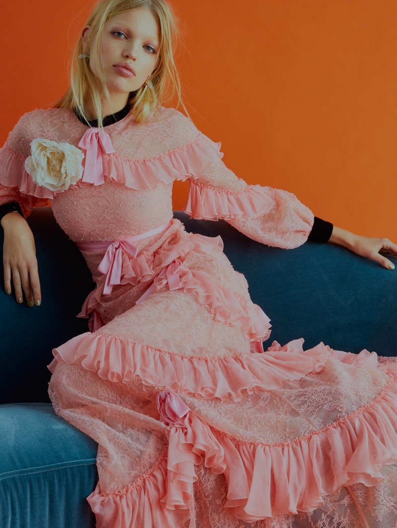 Looking pretty in pink, Daphne Groeneveld poses in Gucci gown with ruffles
