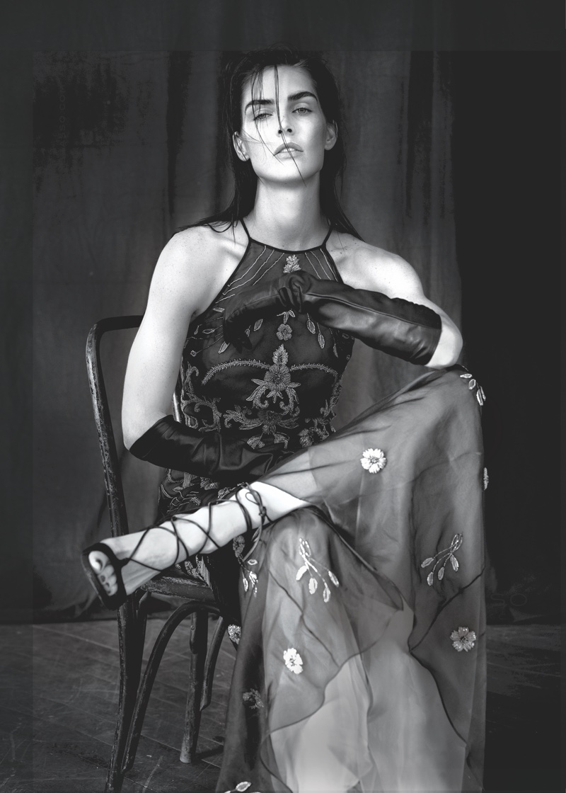 Model Hilary Rhoda poses in embellished Dennis Basso gown