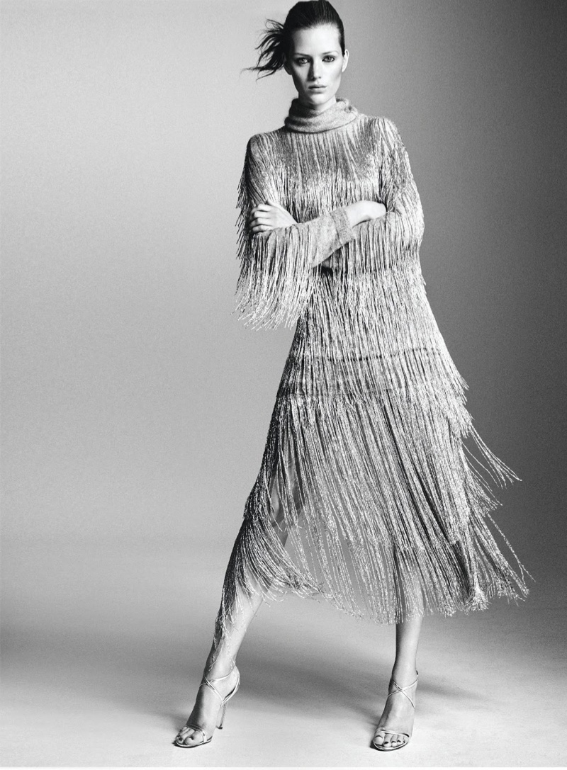 Model Esther Heesch poses in fringe dress