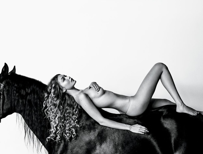 Model Gigi Hadid poses naked on horseback