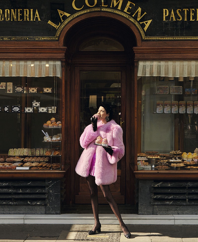 Posing outside of a pastry shop, Hanaa Ben Abdesslem wears pink Gucci fur coat