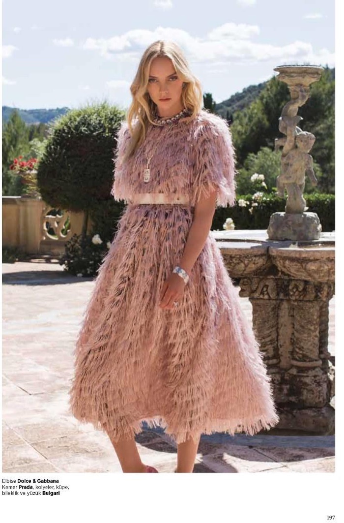 Looking pretty in pink, Heather Marks wears feathered Dolce & Gabbana dress