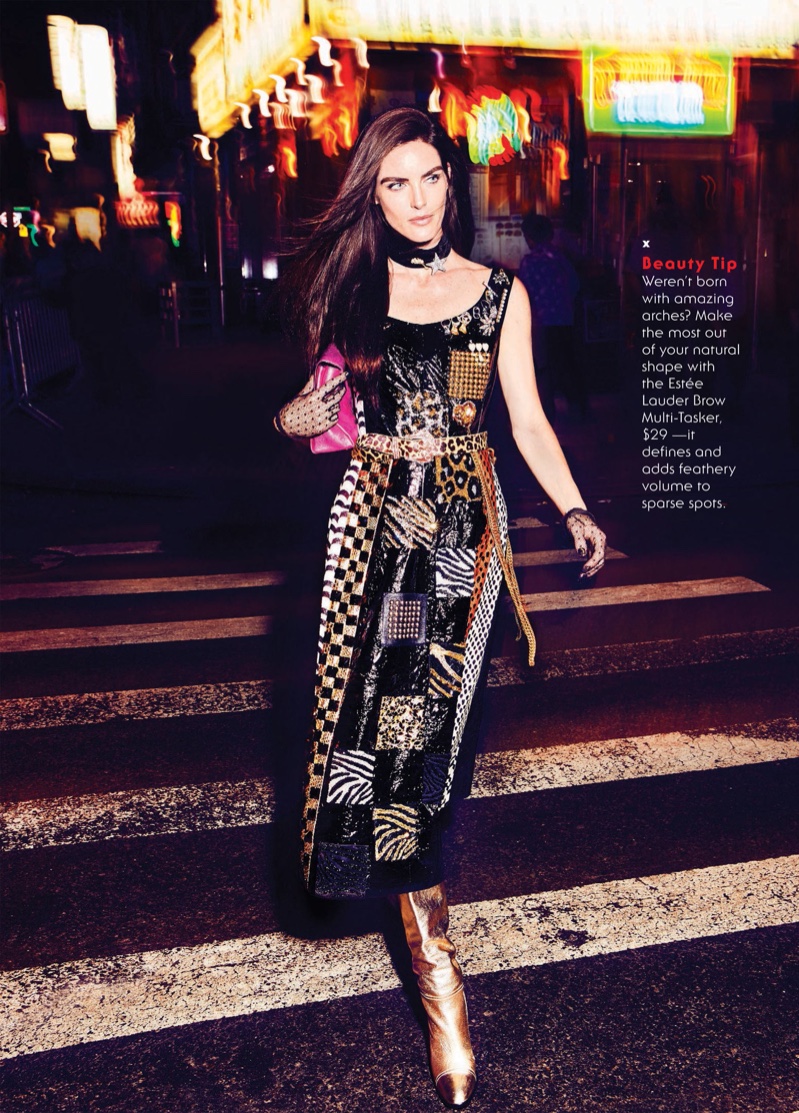 Walking the streets, Hilary Rhoda poses in Marc Jacobs dress, boots, clutch, choker and gloves