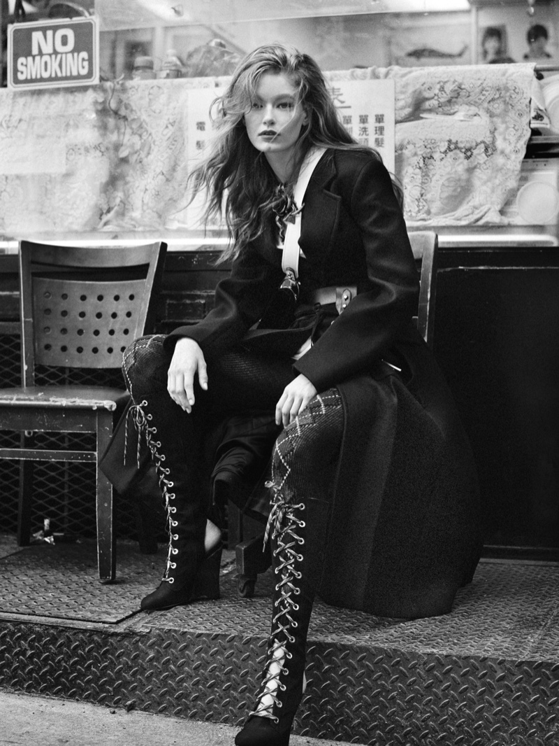Photographed in black and white, Holie-May Saker layers up in Prada’s fall collection
