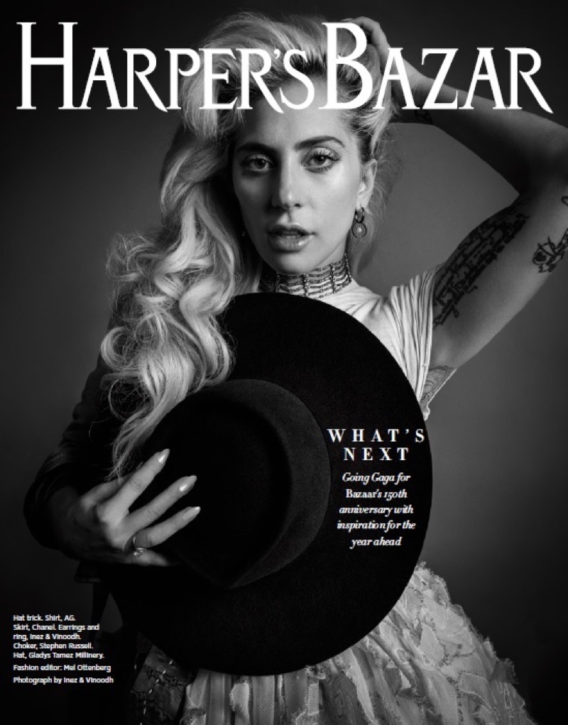 Photographed in black and white, Lady Gaga wears AG shirt, Chanel skirt and Gladys Tamez Millinery hat