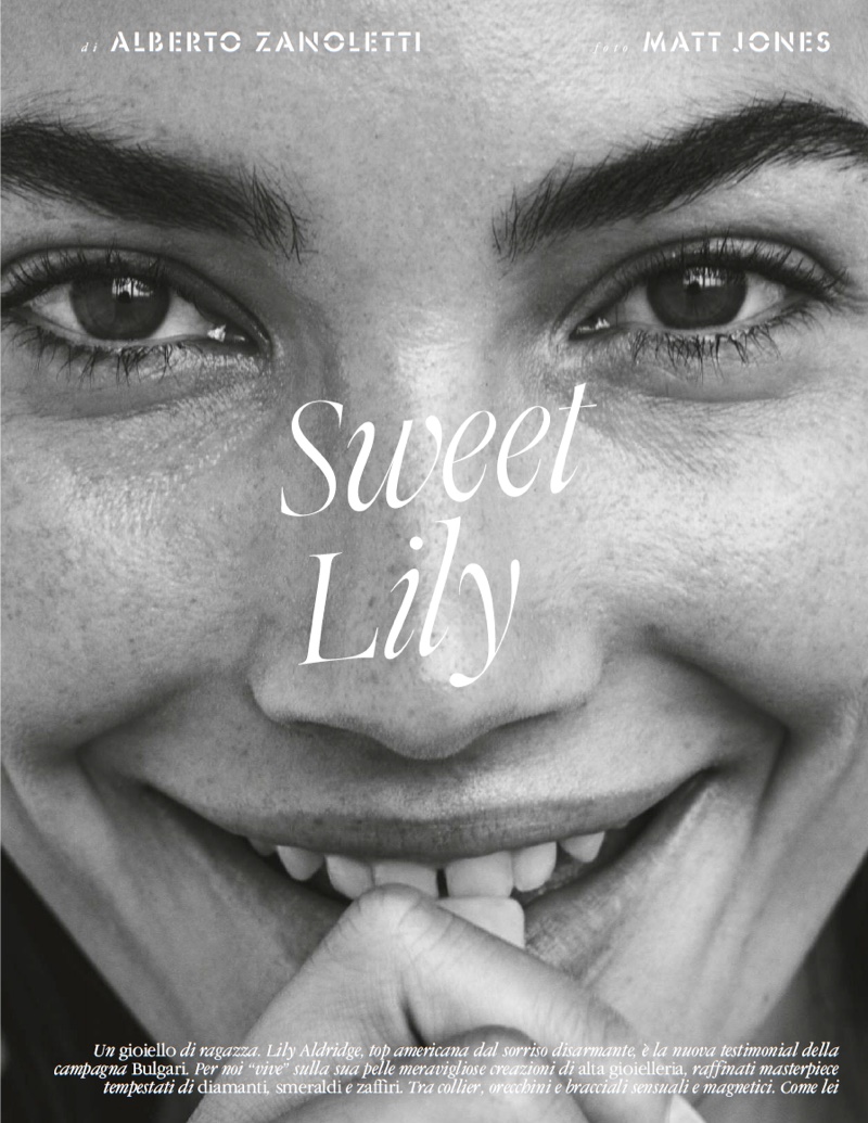 Model Lily Aldridge shows off her smile in this black and white photograph