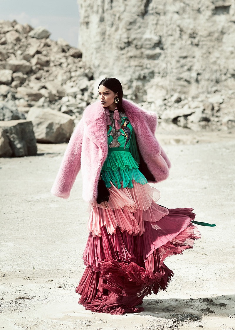Looking pretty in pink, Lizzy Salt poses in J. Crew faux fur coat and Gucci tiered ruffle dress