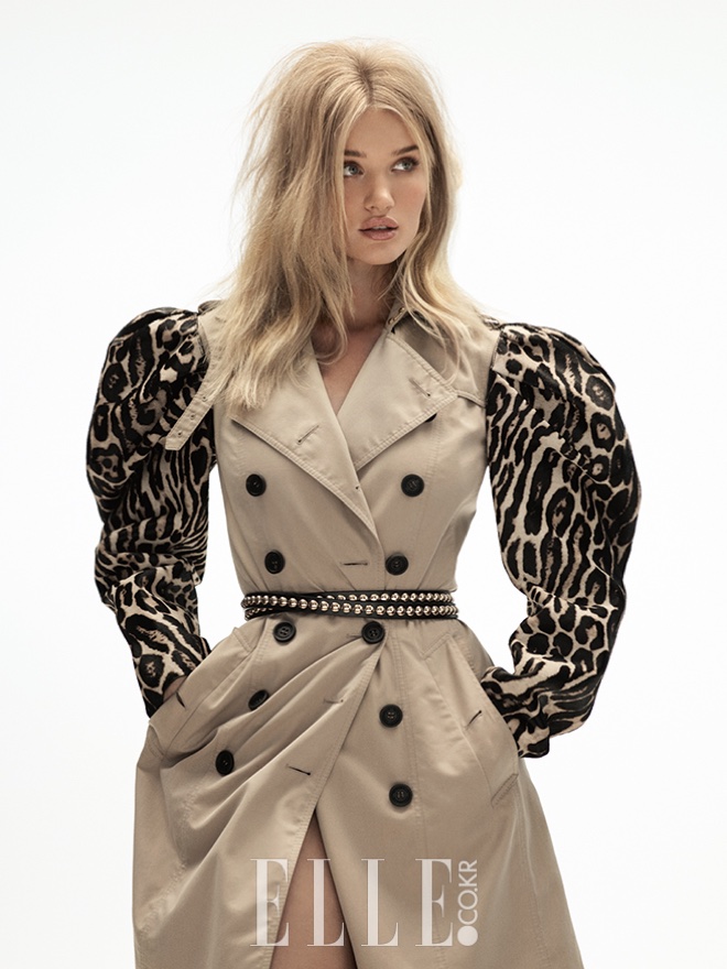 Wearing a brown trench with animal print sleeves, Rosie Huntington-Whiteley serves pure glamour