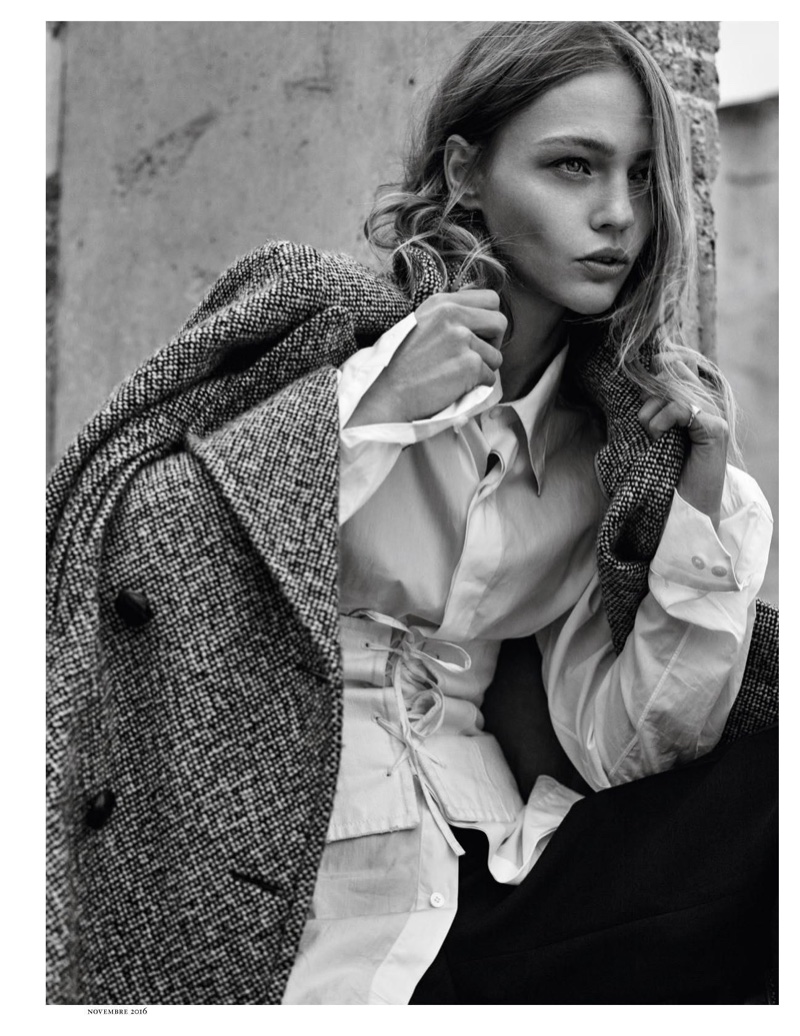 The model covers up in Faith Connexion tweed jacket over CH Carolina Herrera pants