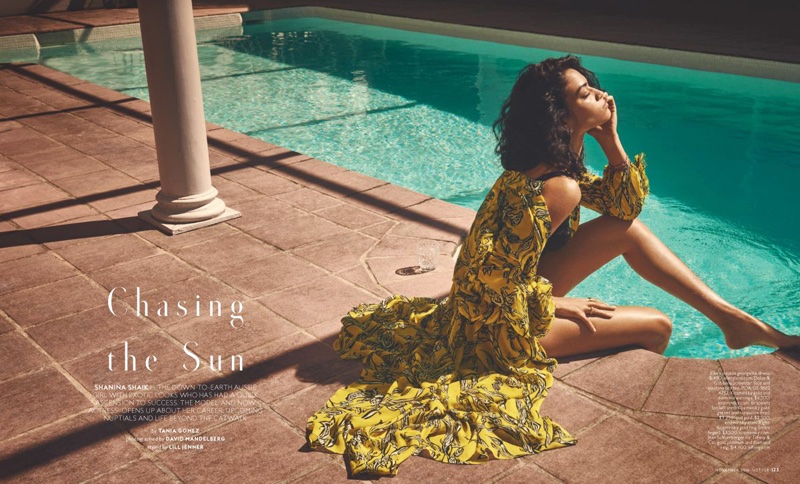 Taking a dip in the pool, Shanina Shaik wears printed Ellery dress with Dolce & Gabbana bra top