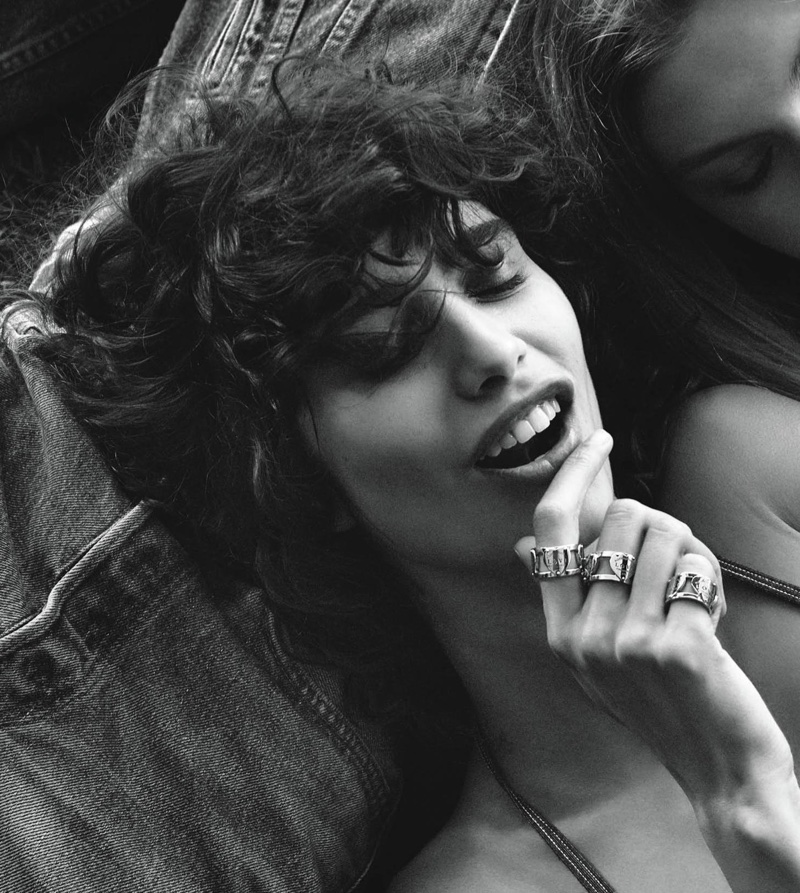 Photographed in black and white, Mica Arganaraz models Tiffany & Co. Return to Tiffany® Love wide rings