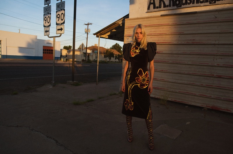 Aline Weber models embellished Prada dress and laced boots