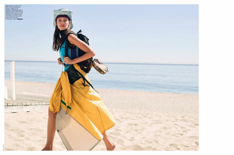 On the beach, Bianca Balti layers up in Prada outfit 