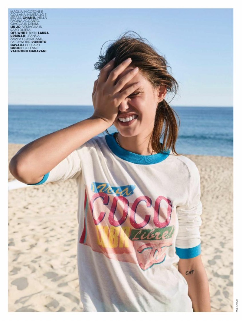 Bianca Balti flashes a smile in Chanel t-shirt