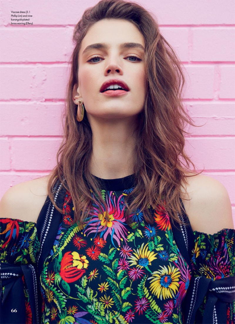 Model Crista Cober poses in 3.1 Phillip Lim dress with Ellery earrings