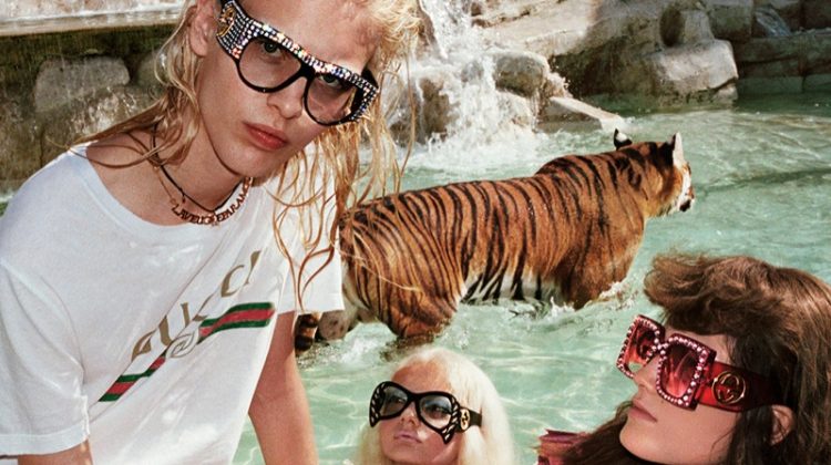 Models pose at the Trevi Fountain in Rome for Gucci's spring 2017 campaign