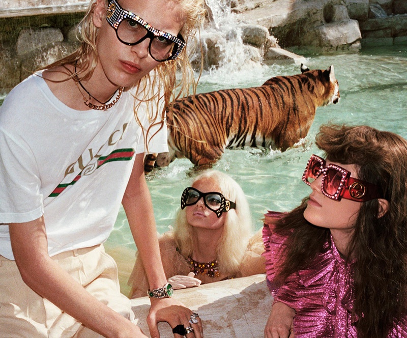 Models pose at the Trevi Fountain in Rome for Gucci's spring 2017 campaign