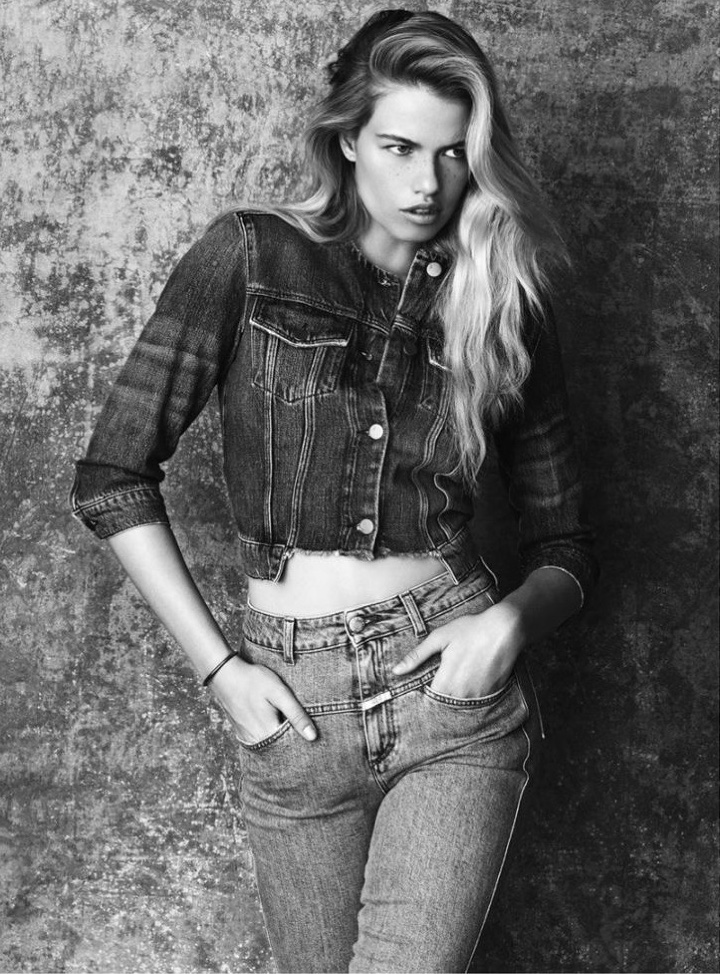 Hailey Clauson poses in J Brand jacket and Closed jeans