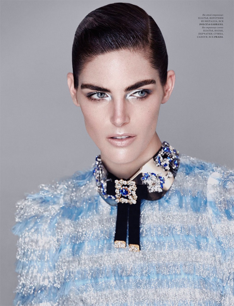 Getting her closeup, Hilary Rhoda poses in Dolce & Gabbana dress and necklace with metallic eyeshadow