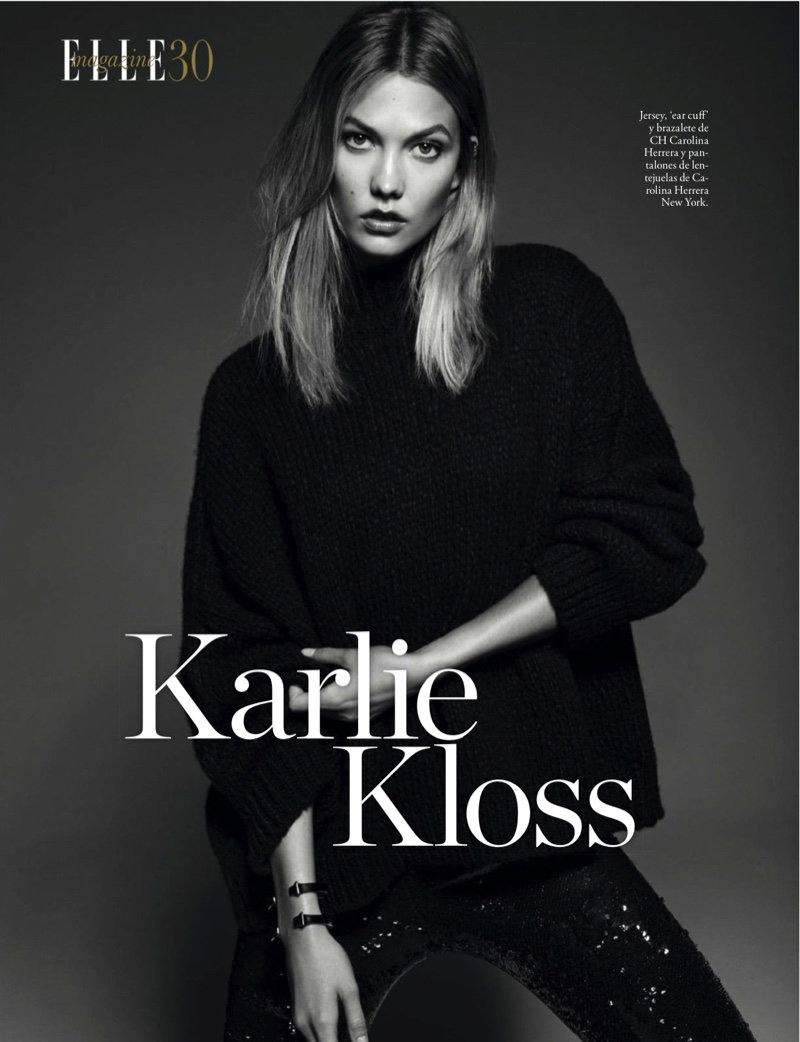 Striking a pose, Karlie Kloss models CH Carolina Herrera jersey sweater and Carolina Herrera pants