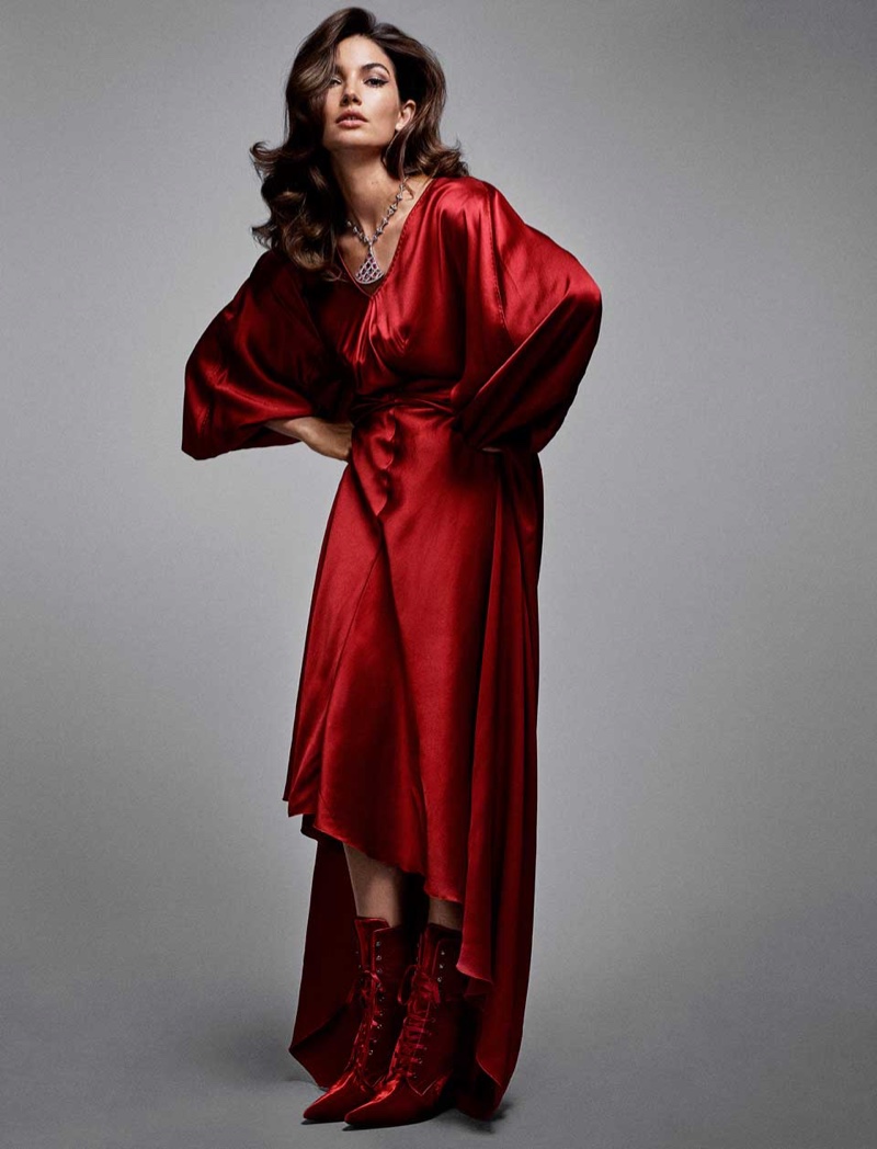 Embracing a bold red color, Lily Aldridge wears Alberta Ferretti dress and boots