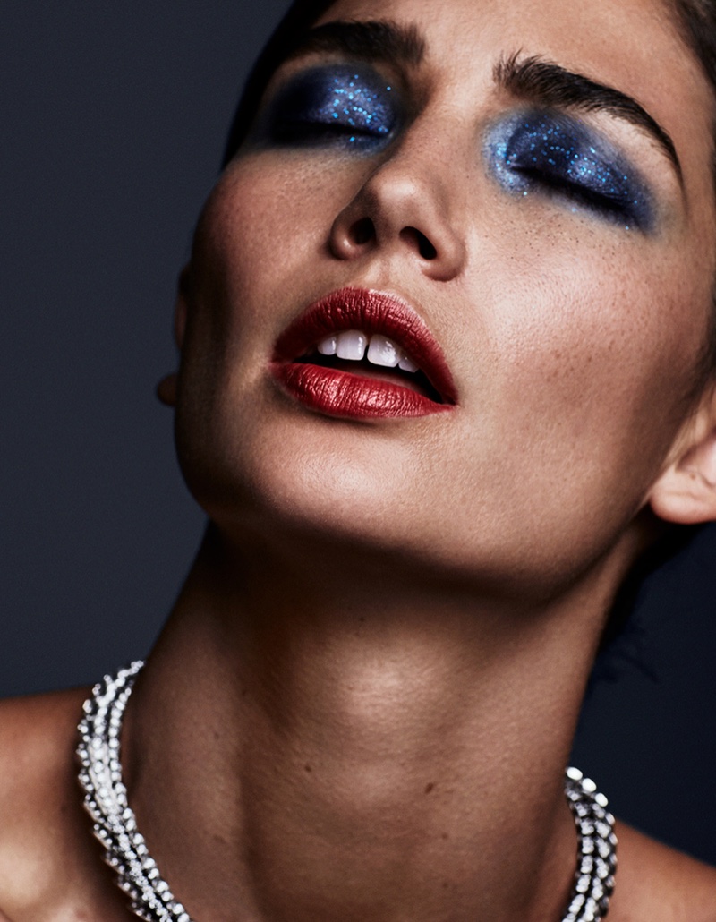 Serving beauty inspiration, Lily Aldridge models sparkling blue eyeshadow with red lipstick