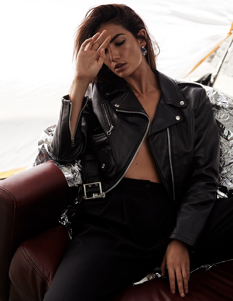Looking cool, Lily Aldridge poses in leather jacket and slim-fit pants