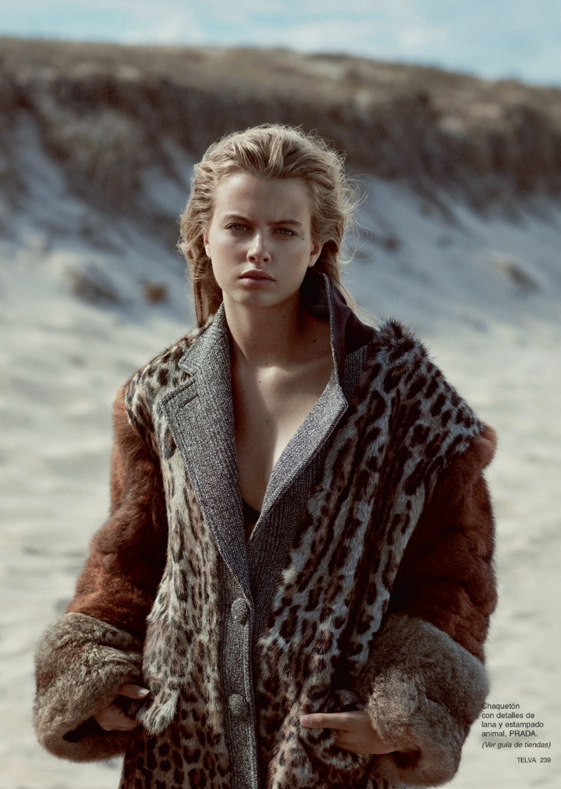 Linda Slava poses in Prada fur jacket with animal print and wool details