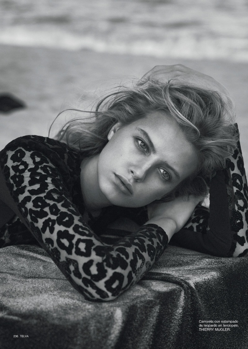 Stunning in this closeup shot, Linda Slava models Mugler top with leopard print