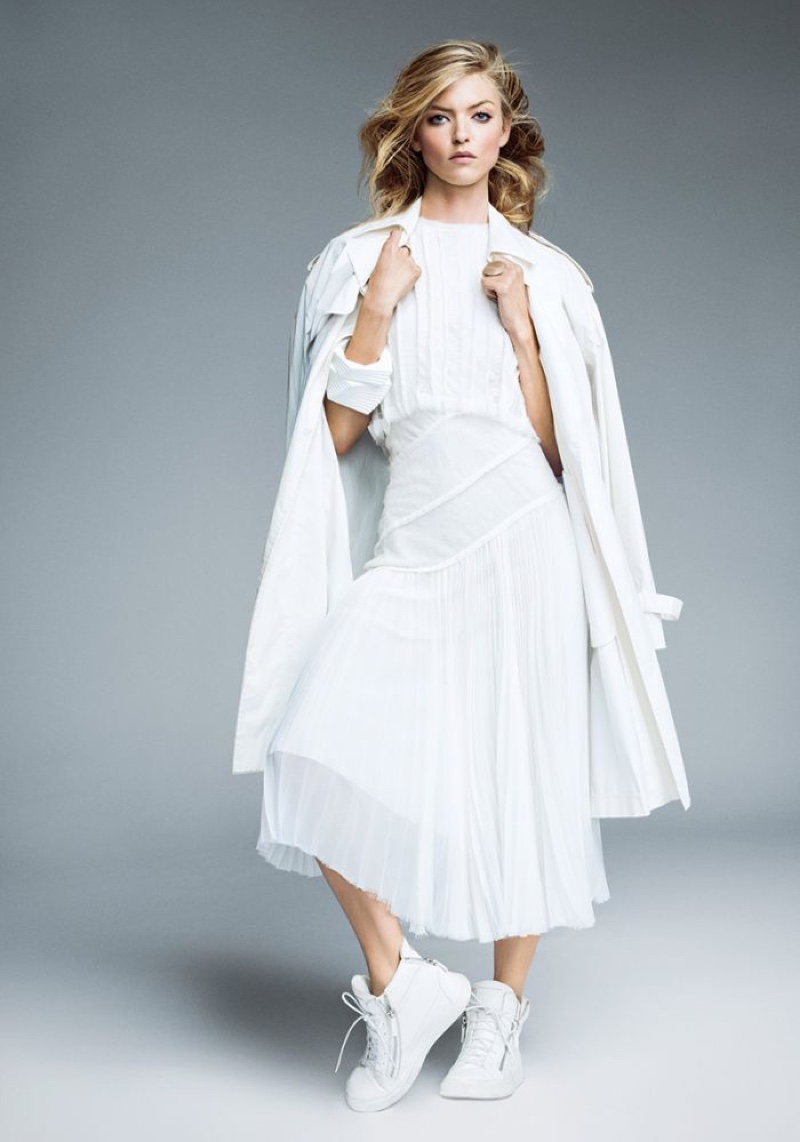 Model Martha Hunt wears an all white ensemble