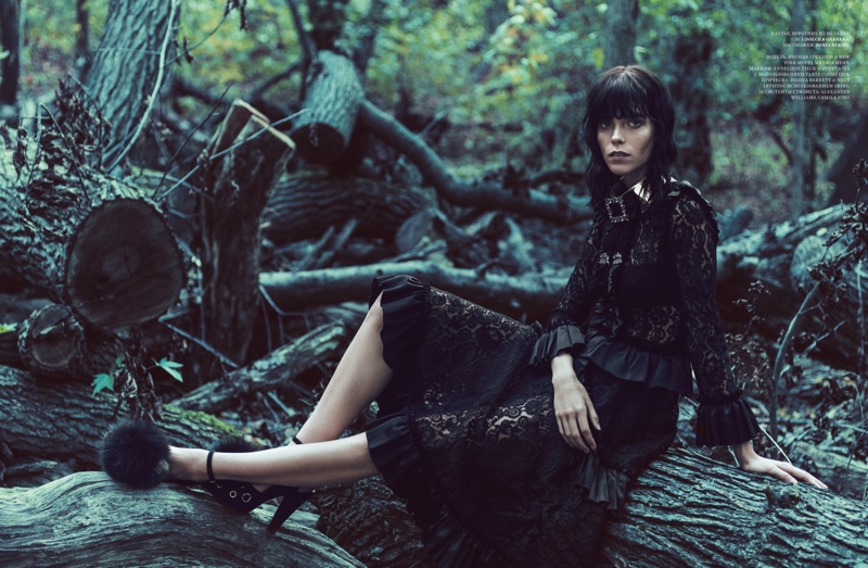 Embracing lace, the model Lounges in Dolce & Gabbana dress with Sonia Rykiel heels