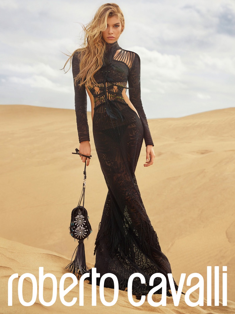 Stella Maxwell wears a black gown in Roberto Cavalli's spring 2017 campaign