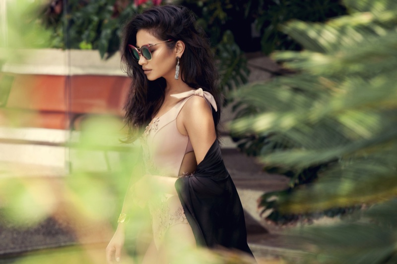 Shay Mitchell wears Baublebar Piñata Tassel Drops in Black/White