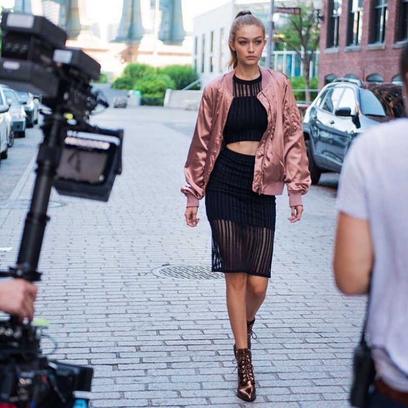 Gigi Hadid poses behind-the-scenes at Stuart Weitzman x Gigi boot shoot earlier this year