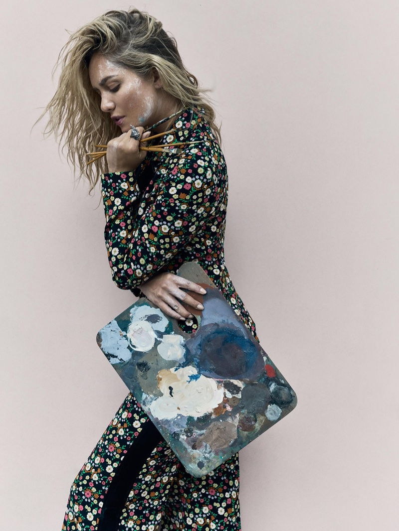 Posing with paint brushes, Tatana Kucharova models Tory Burch floral print jumpsuit