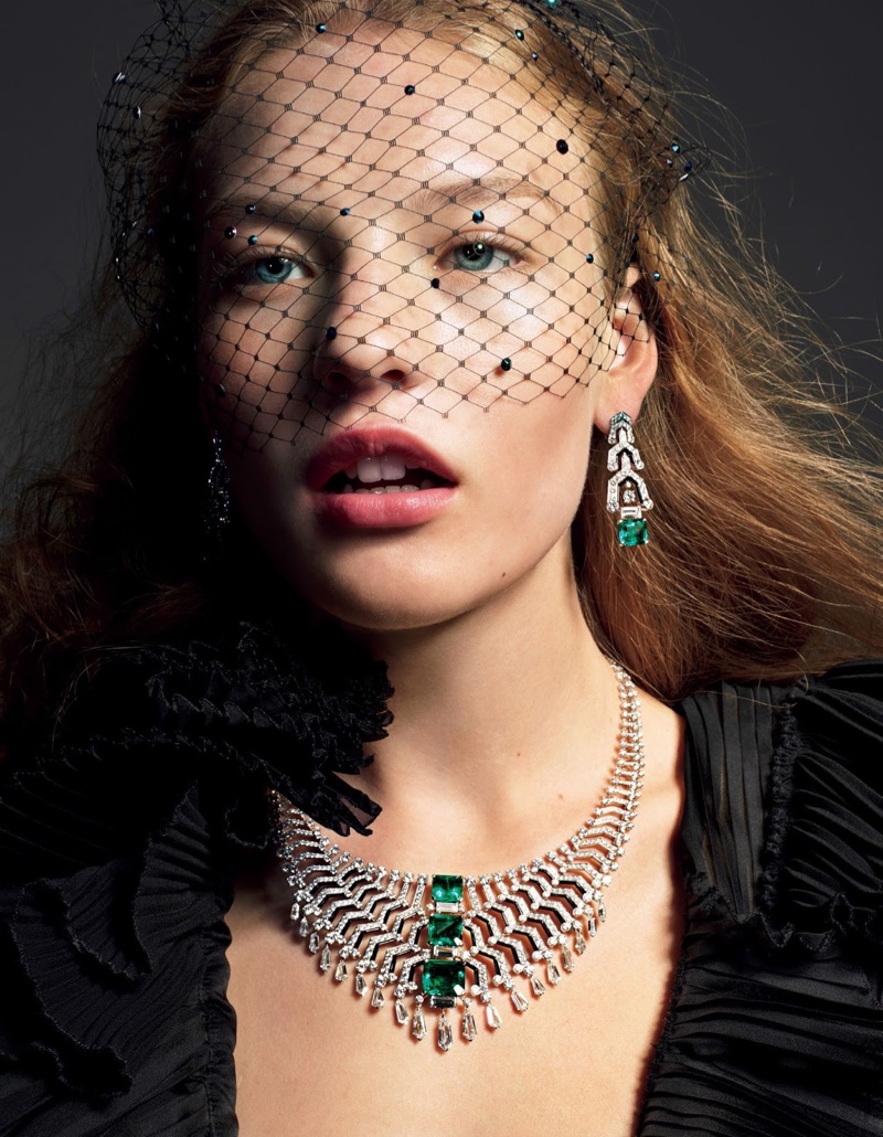 Agnes Akerlund models Cartier jewelry with Ronald van der Kemp haute couture clothing