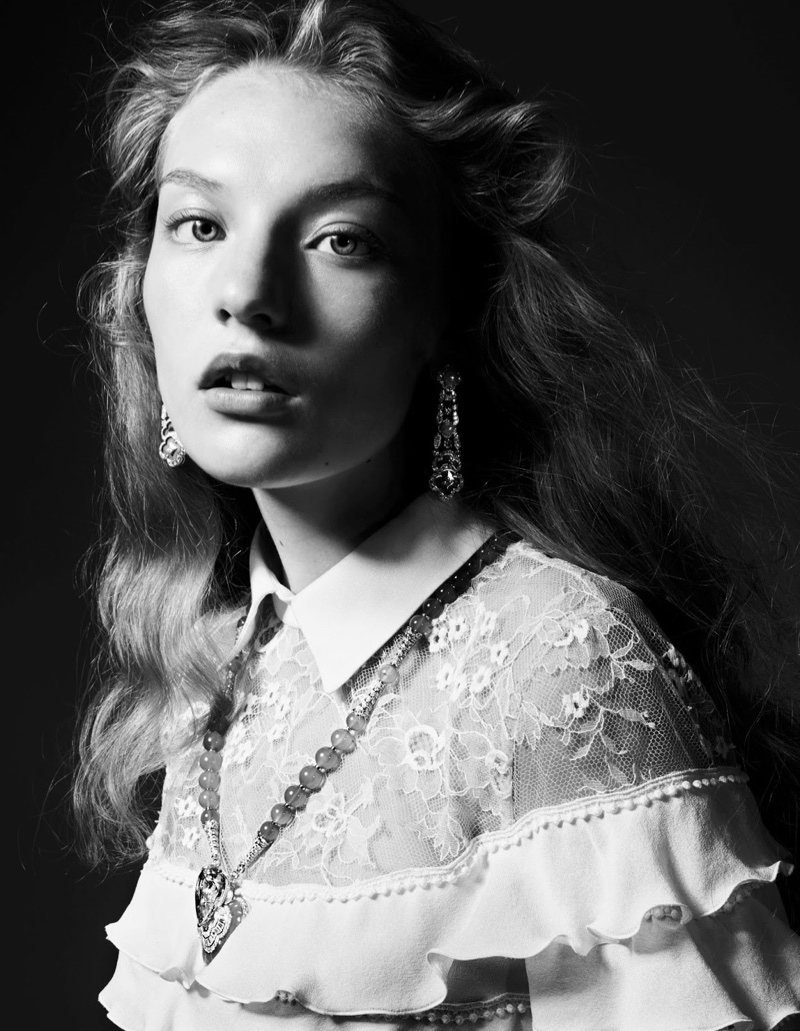 Captured in black and white, Agnes Akerlund sparkles with lace embellished top