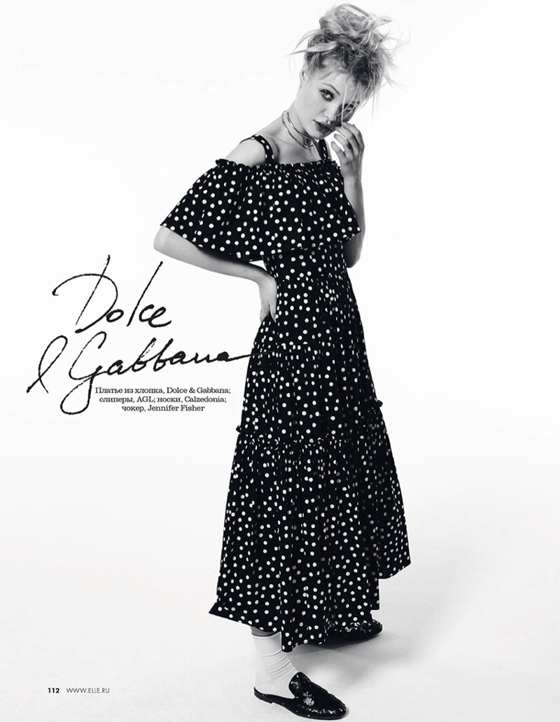 Embracing prints, Camilla Christensen wears Dolce & Gabbana polka dot print dress and AGL loafers