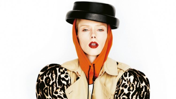 Striking a pose, Coco Rocha wears Burberry trench coat with animal print puffed sleeves